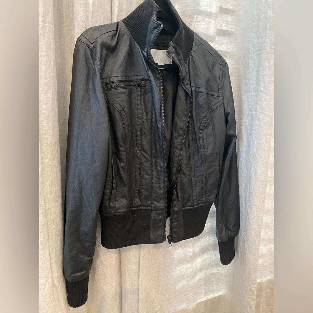 Black leather zip up jacket. M